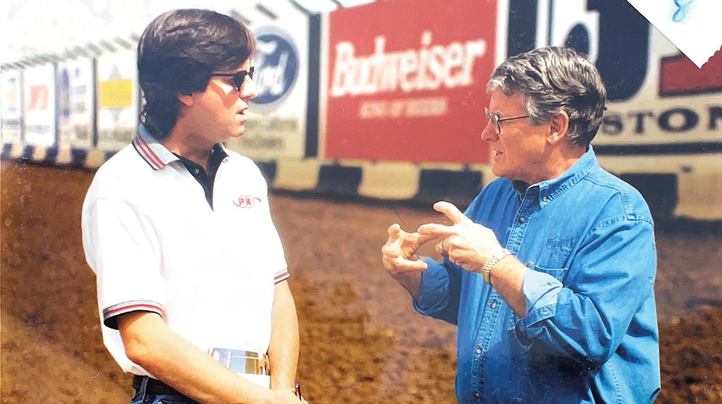 John Kilroy interviewing subject at race track