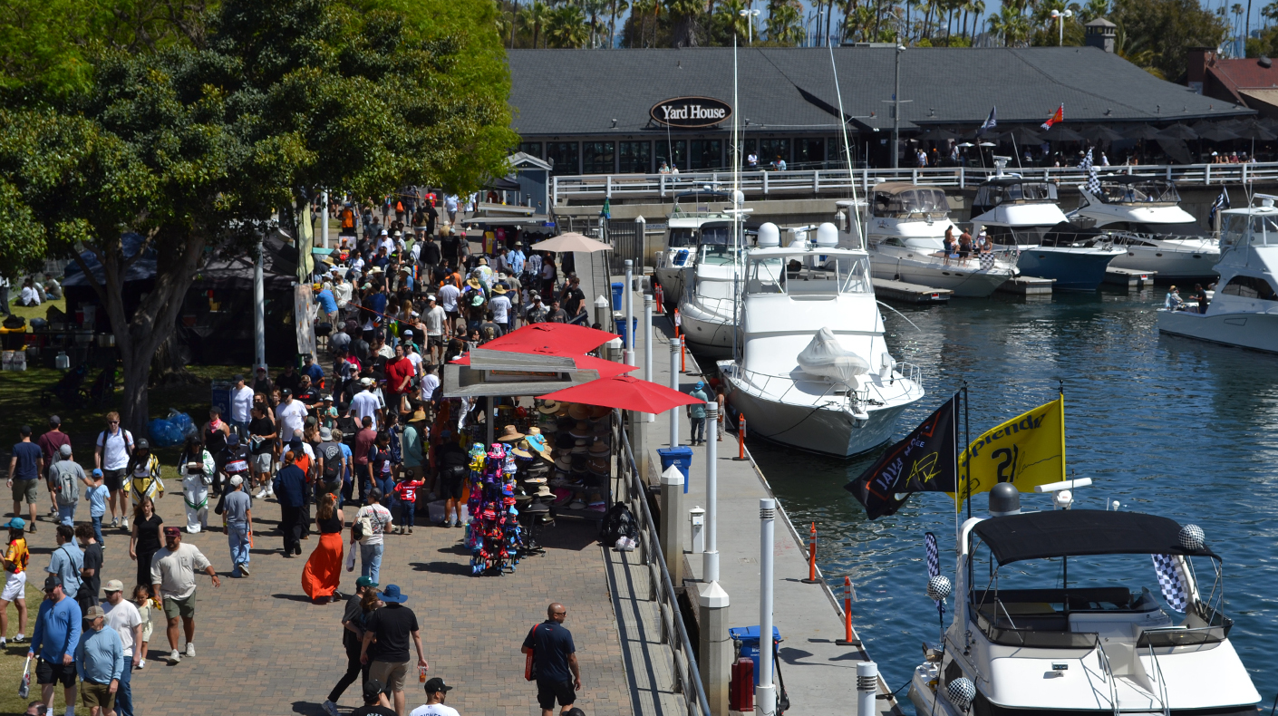 Fans walking along the water at the Acura Grand Prix of Long Beach.
