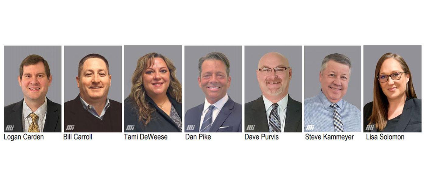 Headshots of Motion's seven recent promotions