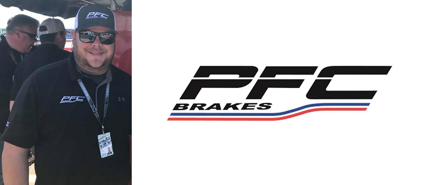 Chris Dilbeck in the pits, PFC Brakes logo