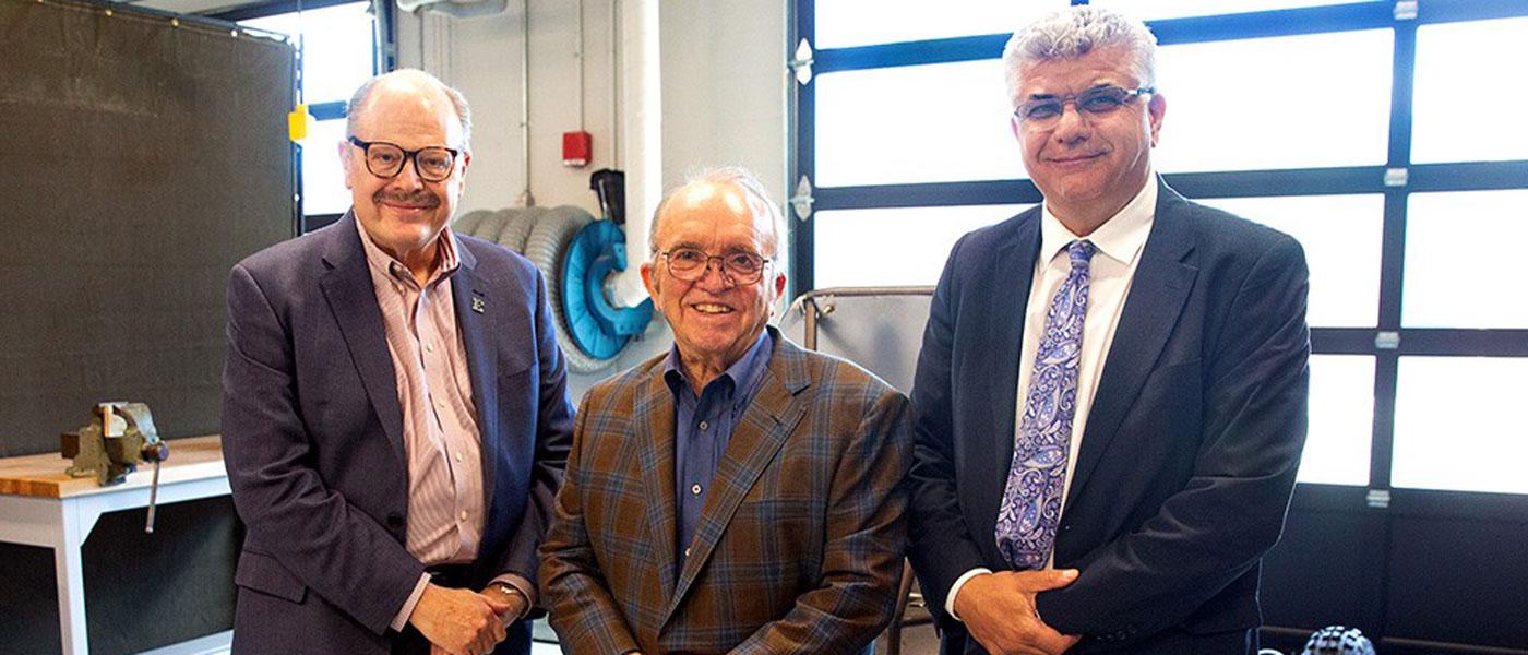 Photo of EMU President Dr. James Smith, Jack E. Roush, and EMU Dean Mohamad Qatu courtesy of EMU