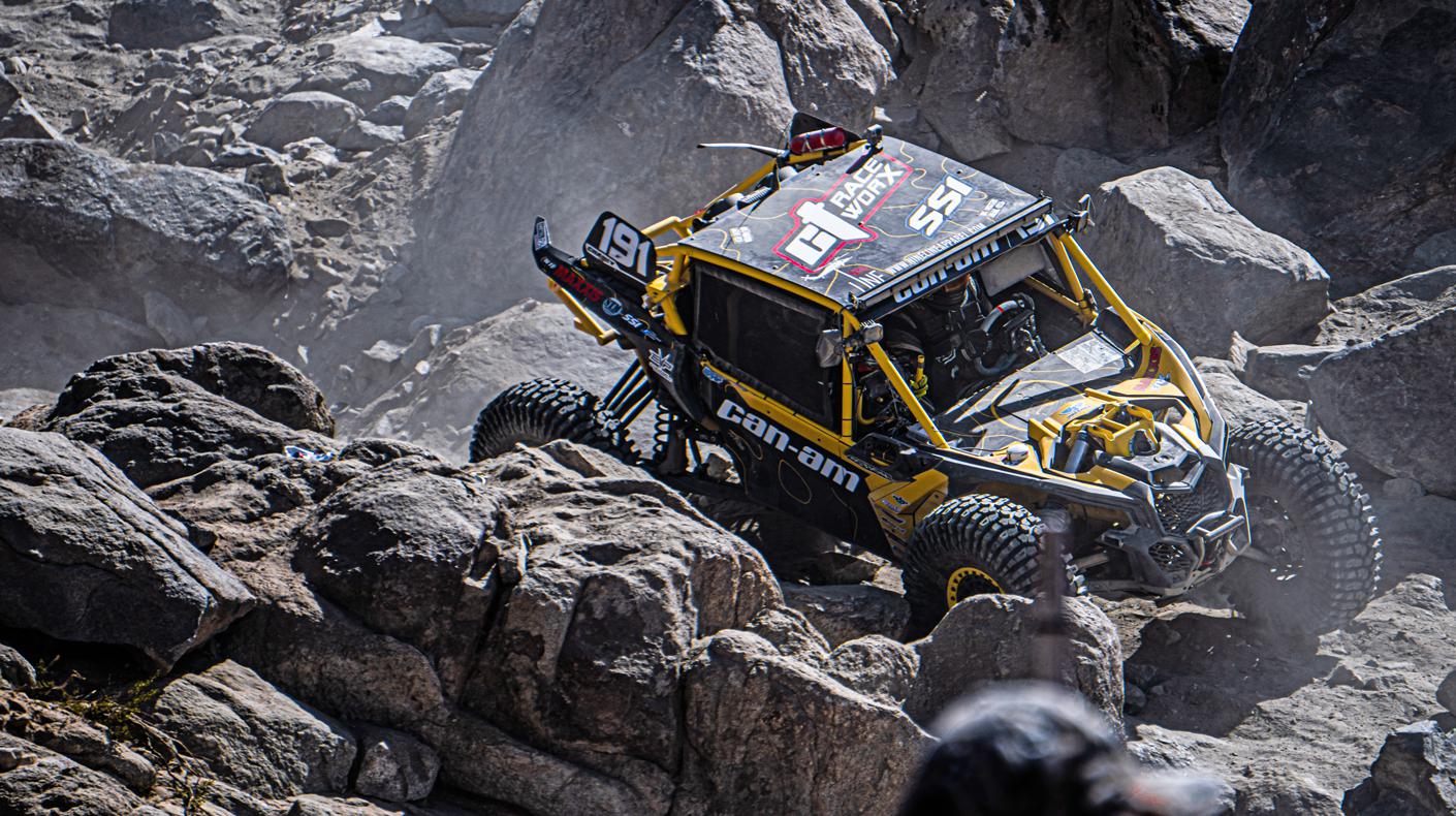 A UTV crawling across rocks in Johnson Valley, California.