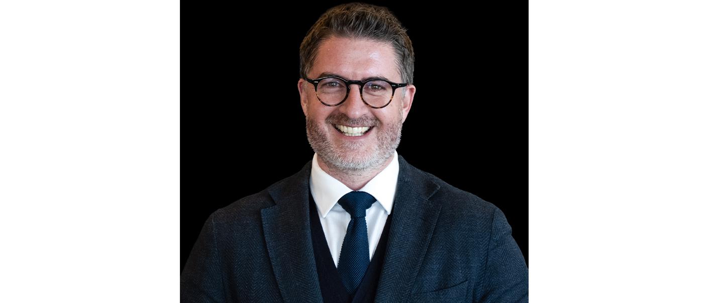 A headshot of new Formula E chief commercial officer Will Brown.