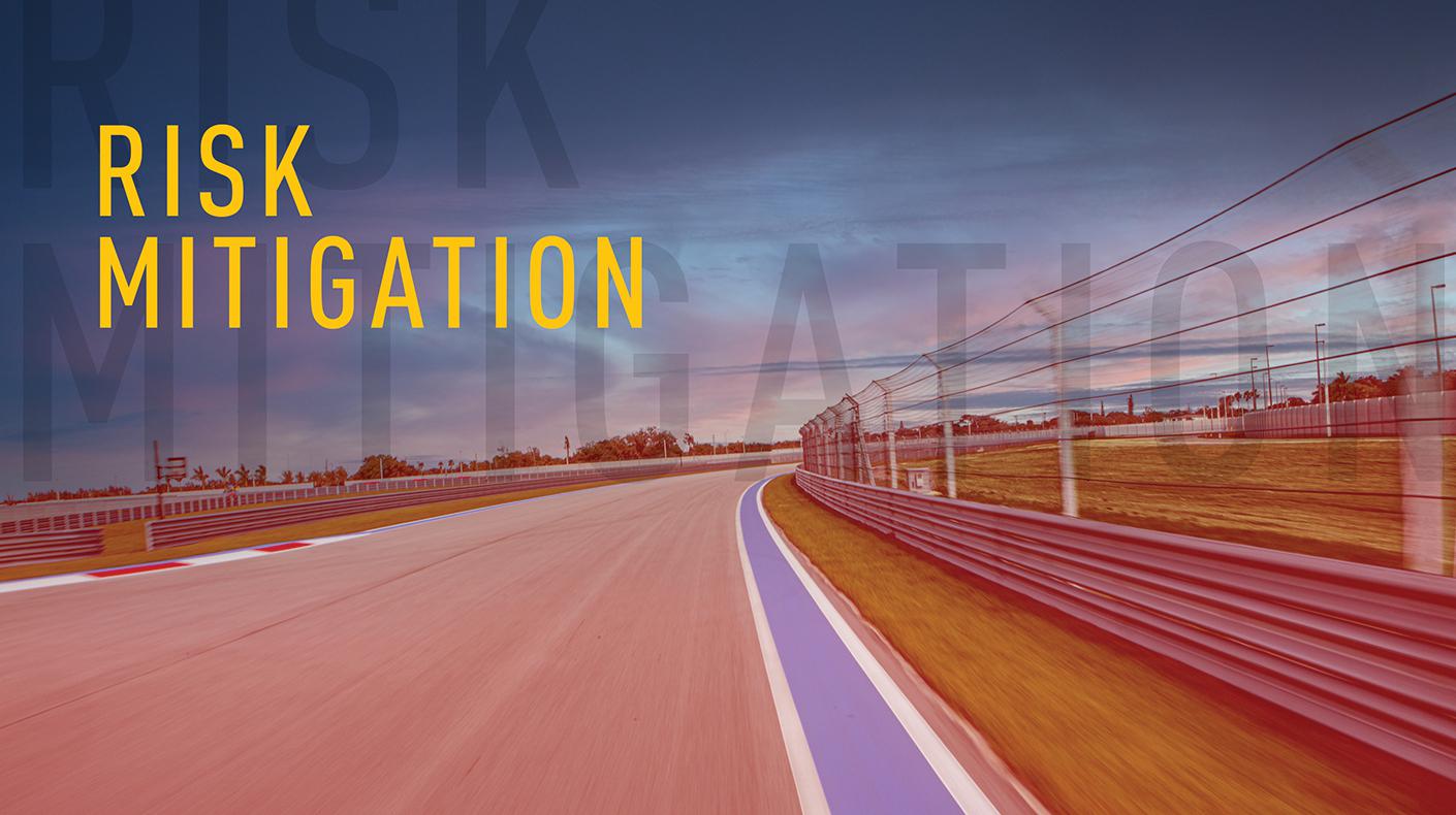 Risk Mitigation over an image of a race track.