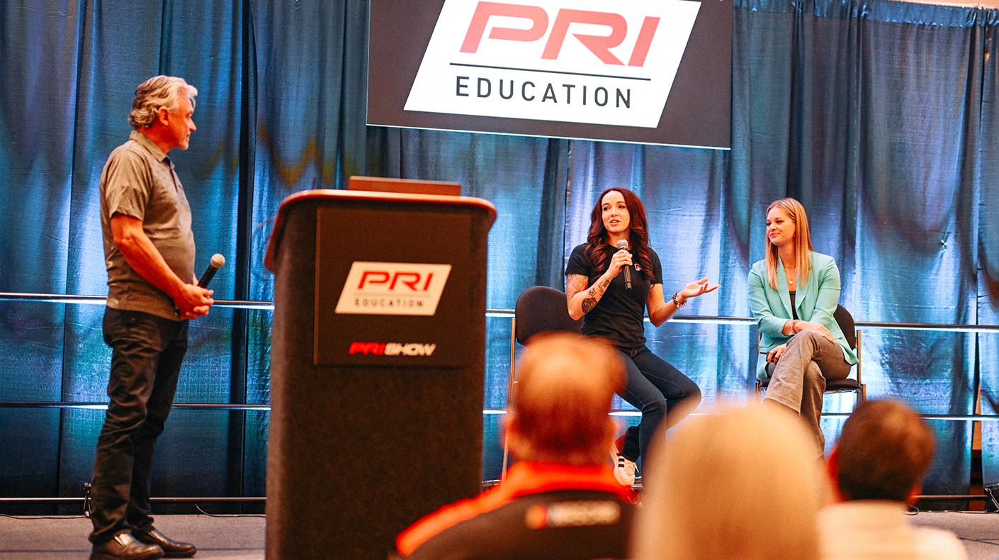 Panelists speaking during a PRI Education seminar.