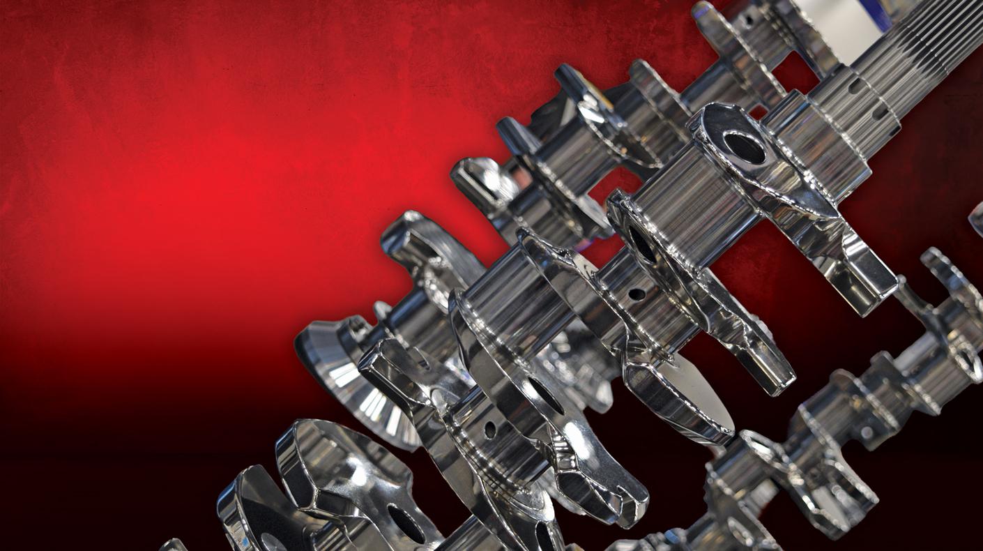 Motorsports crankshafts and a textured background.
