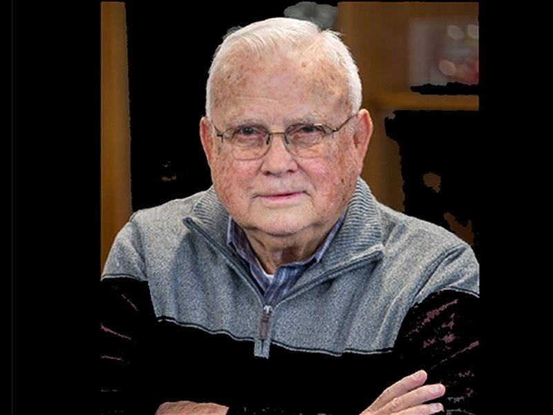 George Lane crossing his arms