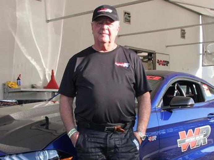 Chuck Watson Sr. in front of the Watson Racing 2016 Mustang Cobra Jet at NMCA competition