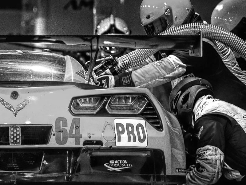 Race team refueling race car