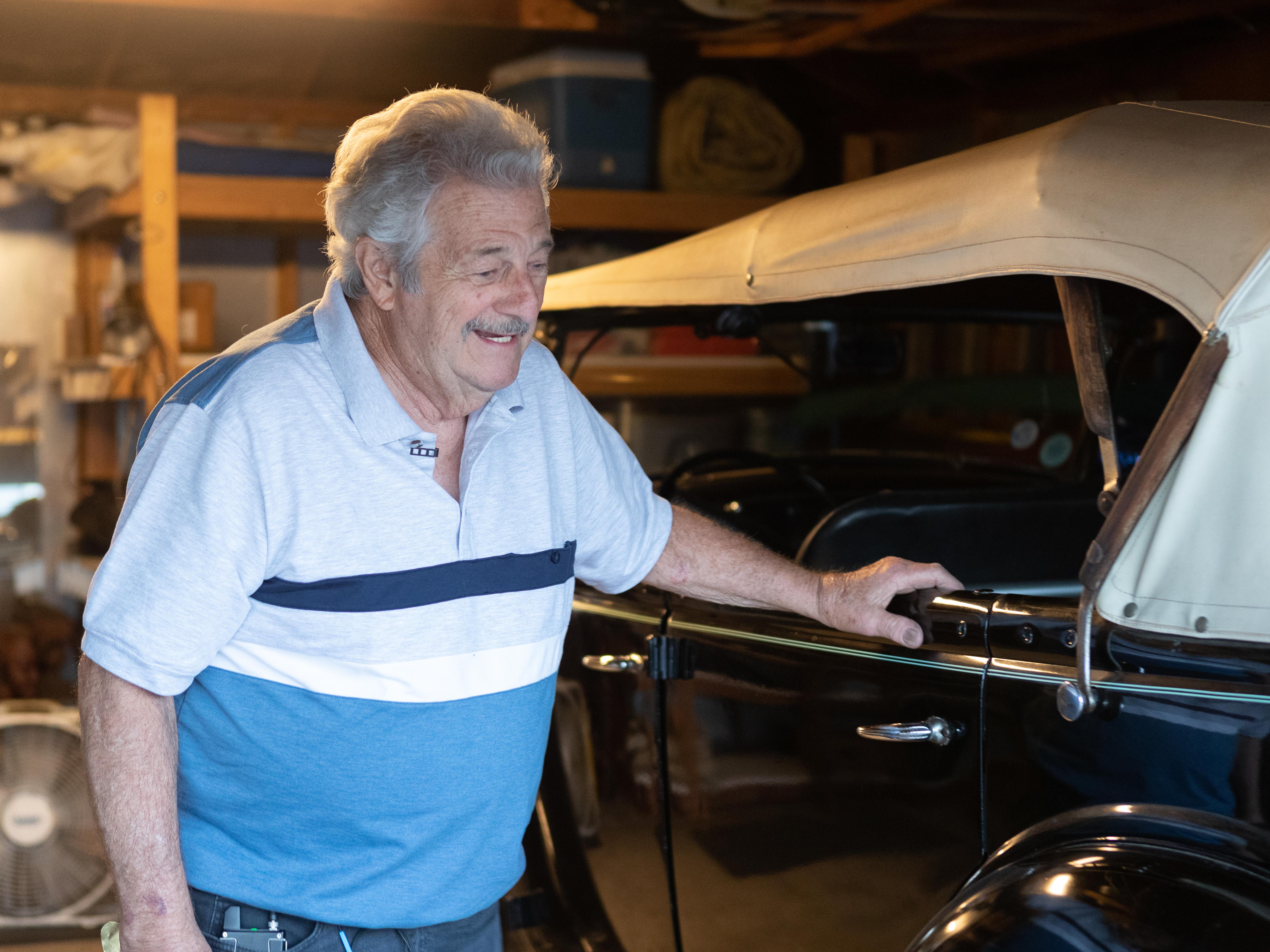 Chris "The Greek" Karamesines in his garage