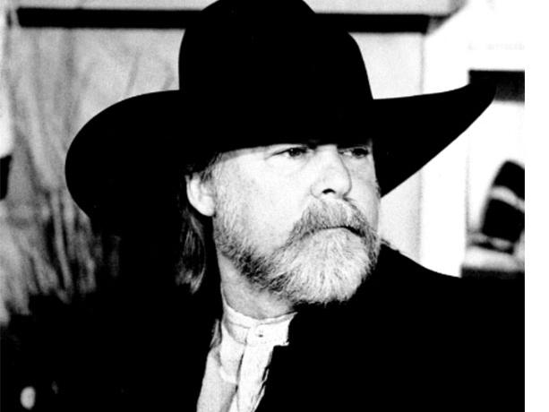 Martin & Company co-founder and CFO, Randal “Randy” L. Martin headshot, and Martin & Company logo