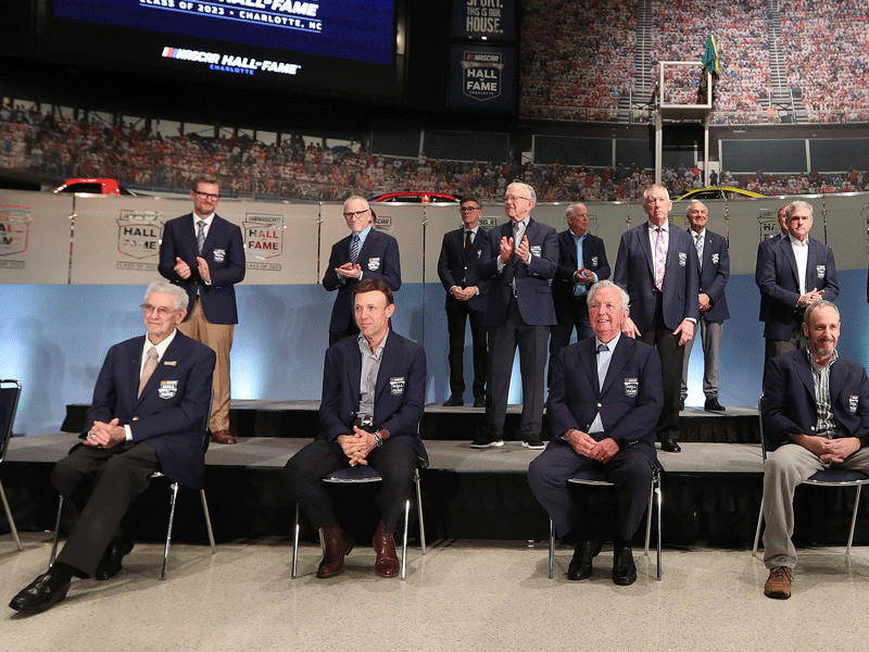 (L-R) NASCAR Hall of Famers (front-row) Bobby Allison, Leonard Wood, Matt Kenseth, Hershel McGriff, Kirk Shelmerdine, Jerry Cook, Jack Roush (back-row) Dale Earnhardt Jr., Mark Martin, Joe Gibbs, Bobby Labonte, Red Farmer, (back-row) Ray Evernham, Dale Jarrett and Ron Hornaday Jr. (Photo by David Jensen/Getty Images)
