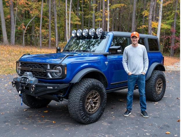 Joey Logano in front of the 2021 Bronco First Edition and the rear of the Bronco First Edition