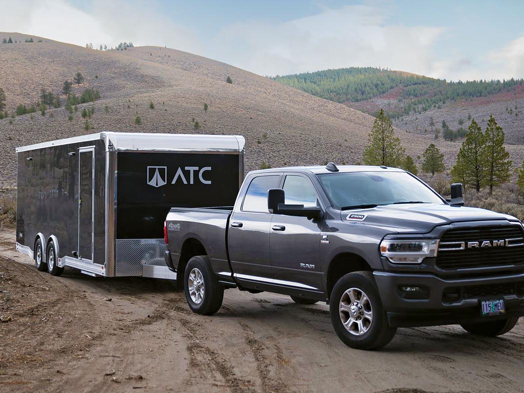 Image of Ram truck hauling a race trailer courtesy of ATC Trailers