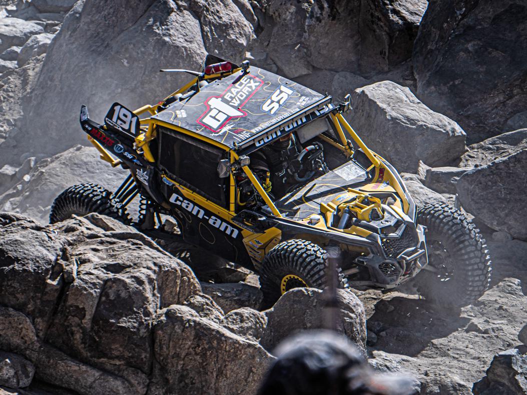 A UTV crawling across rocks in Johnson Valley, California.