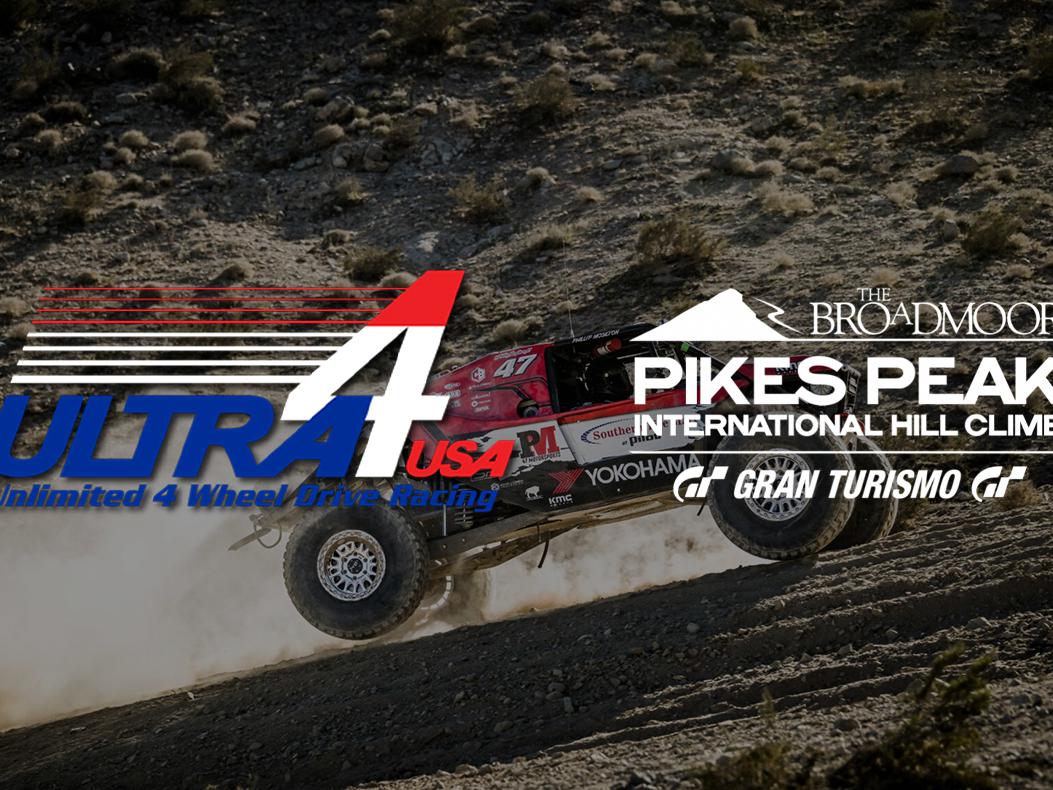 A Ultra4 car driving uphill with the Ultra4 and Pikes Peak Hill Climb logos over it.