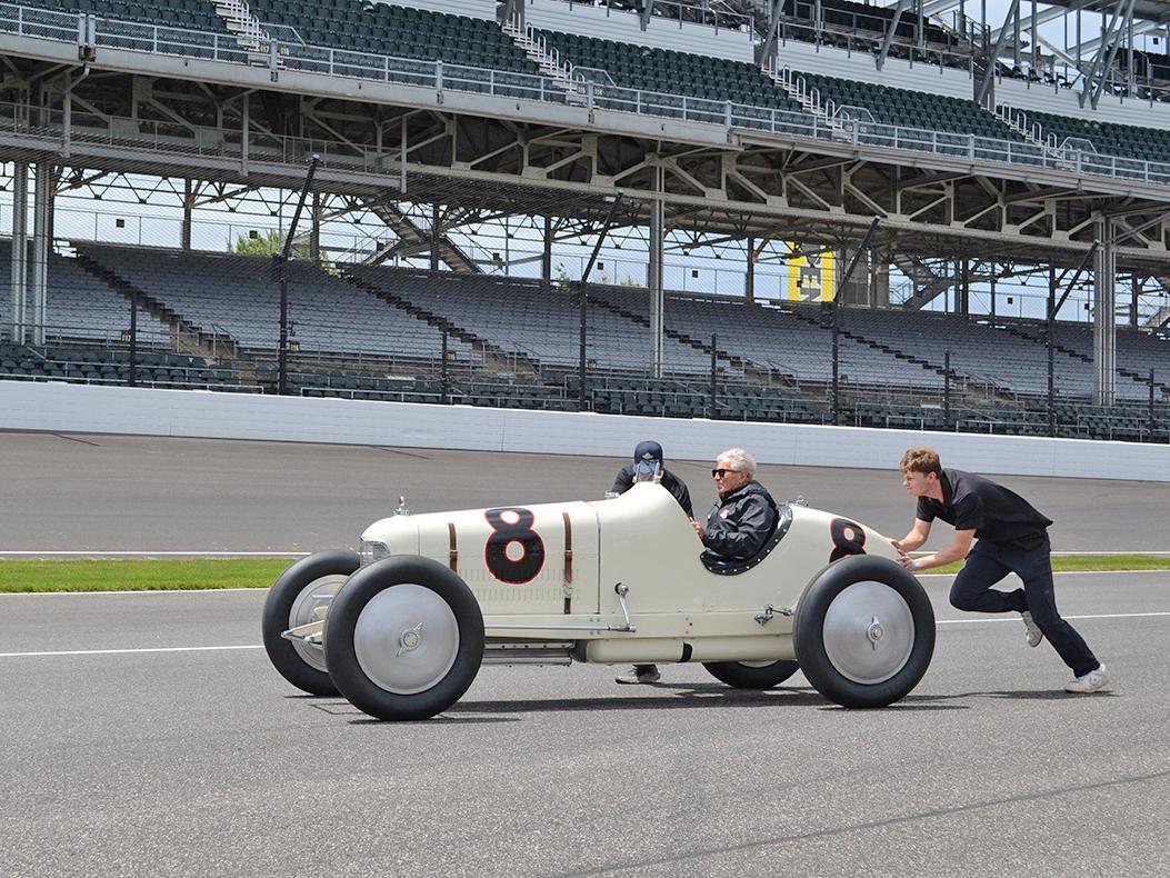 Mario Andretti in a vintage race car at IMS.