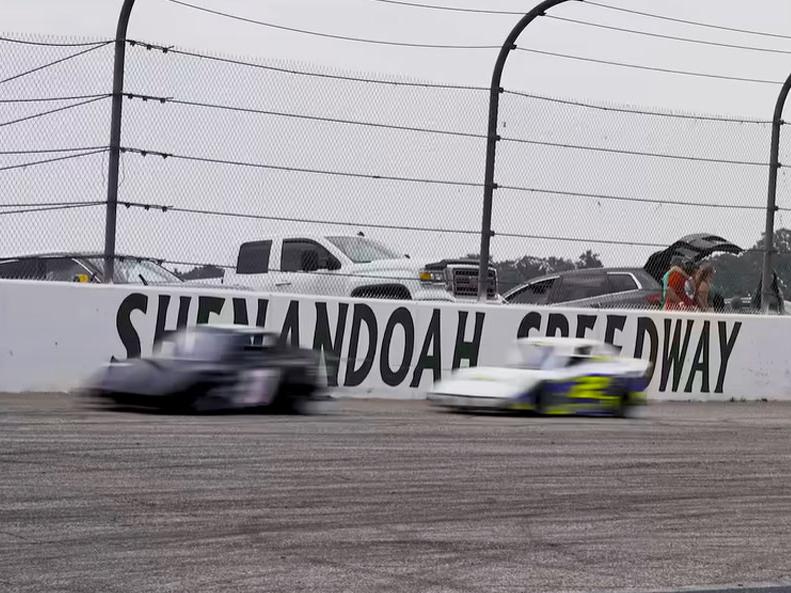 Shenadonah Speedway in VA cars on track. Courtesy of PBS News Hour and YouTube.